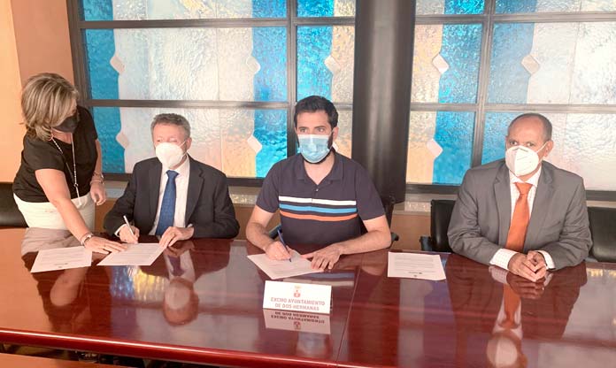 firma-acuerdo-once-juan-pedro quioscos de la ONCE